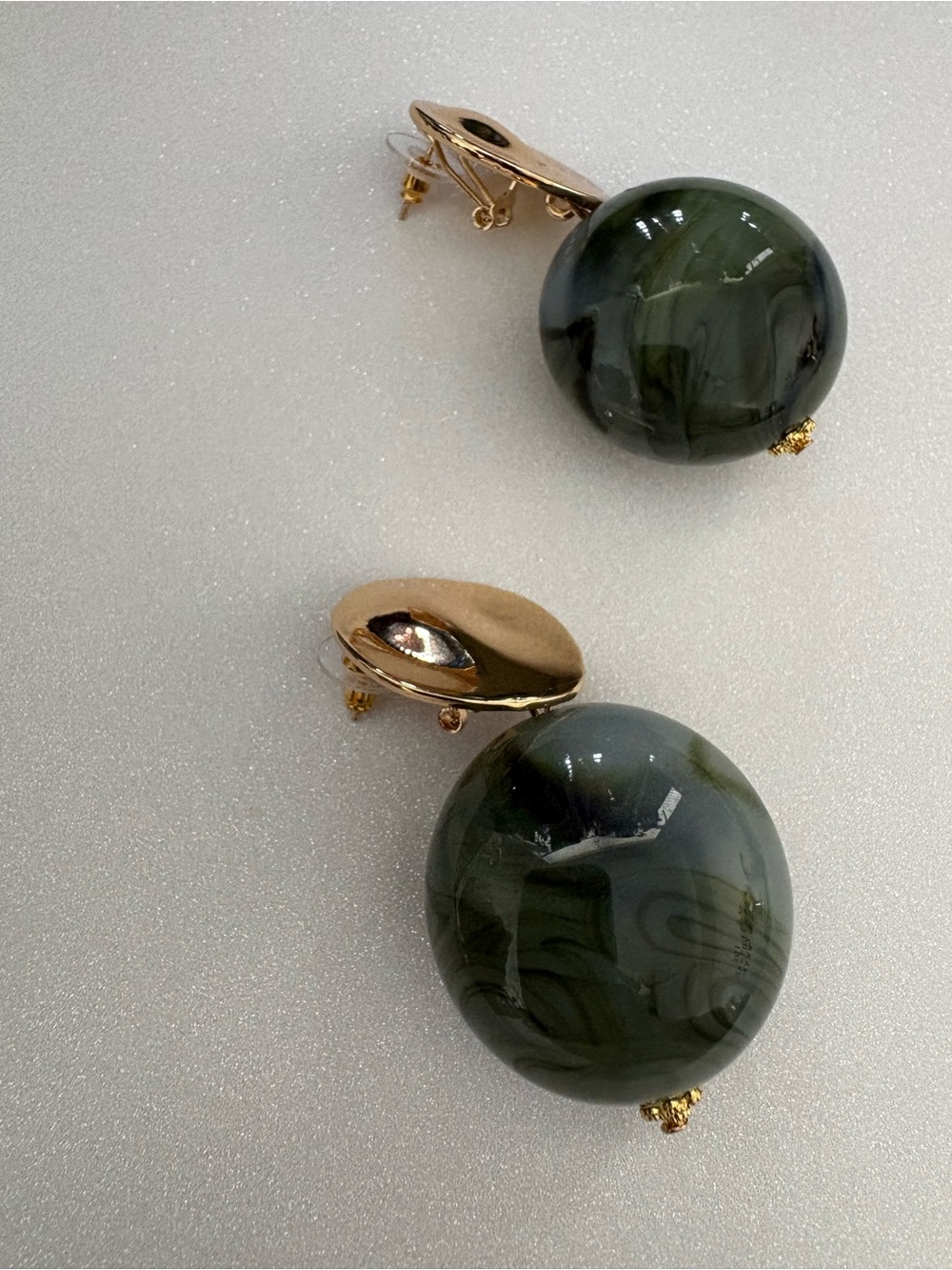 Gold-Tone Clip Earrings with Olive Green Marbled balls